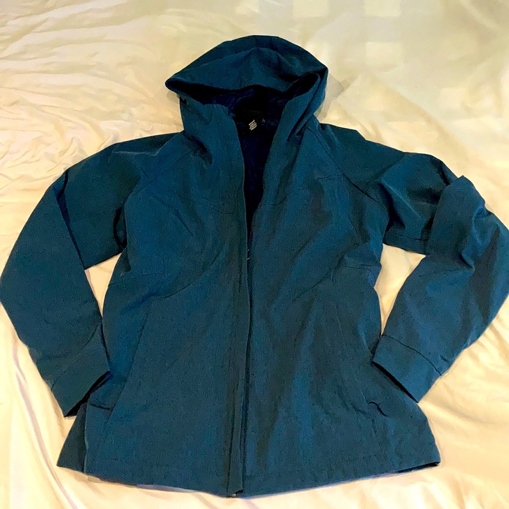 Women’s teal warm jacket.